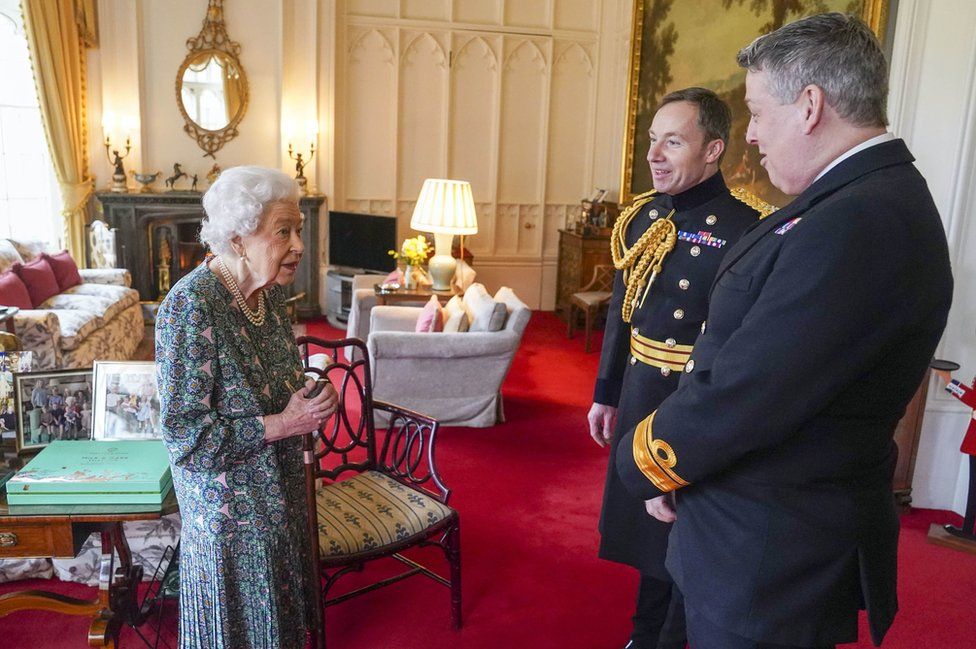 Queen Elizabeth with Rear Admiral James Macleod and Major General Eldon Millar (right)