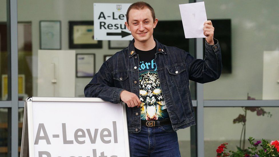 Drew Totton celebrates after receiving his A-level results at Lagan College, Belfast.