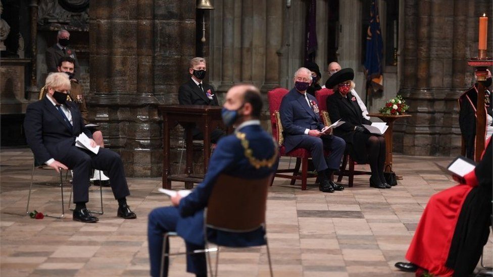 Boris Johnson (left) at Westminster Abbey with Prince Charles and the Duchess of Cornwall (right)