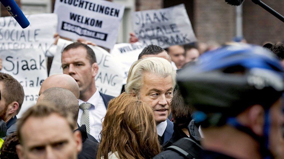 Protesters and Dutch police surround Dutch politician Geert Wilders, leader of the Party for Freedom (PVV) in the center of Spijkenisse, The Netherlands, 18 February