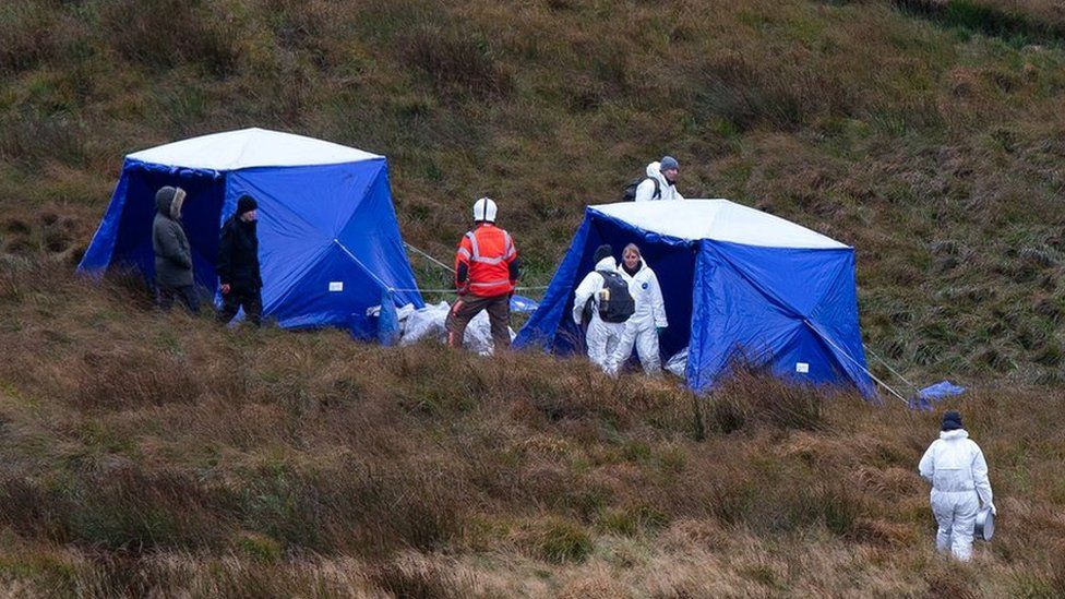 Police specialists and firefighters continue the search for Moors murder victim Keith Bennett