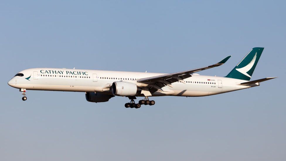 A Cathay Pacific Airways Airbus 350-1000 landing at Rome Fiumicino airport.