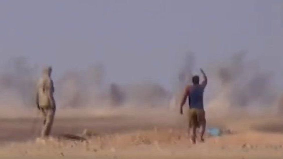 Video footage purportedly showing Syrian rebels reacting to air strike on refugee camp on Syria-Jordan border (12 July 2016)