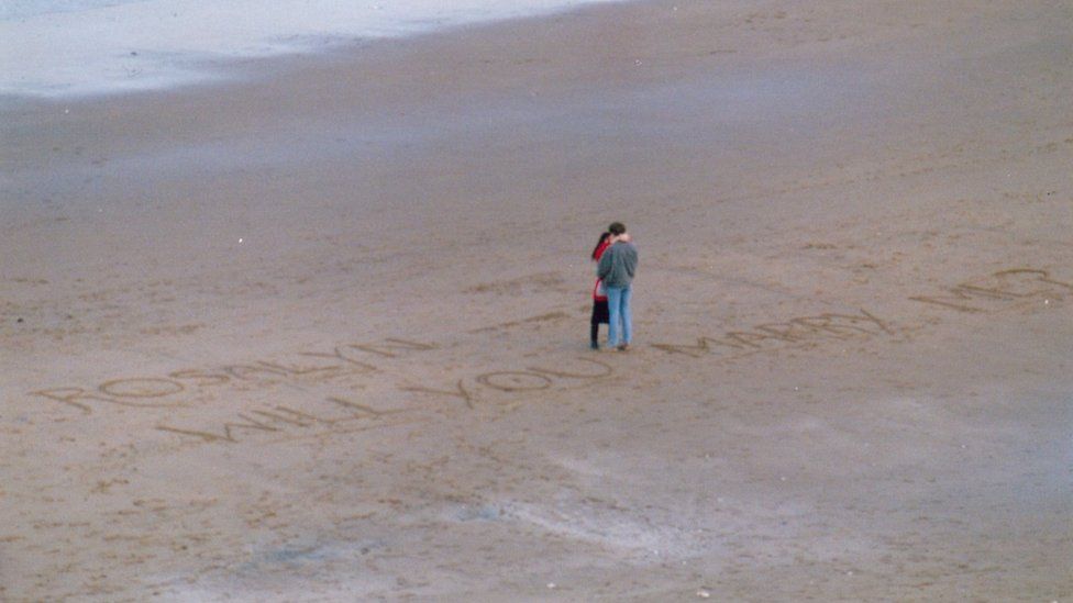 Two people on beach