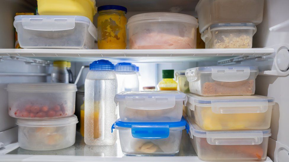 Plastic containers in a fridge