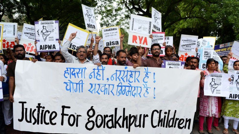 Activists and Indian students hold at a protest in Delhi in 2017 against the deaths of children in the Gorakhpur hospital.