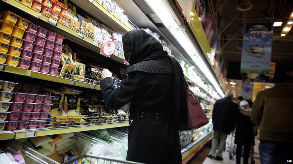 Woman shopping in Tehran supermarket (file photo)