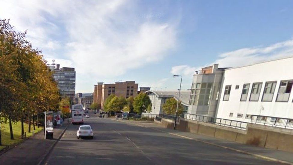 Woman injured after being hit by taxi in city centre - BBC News