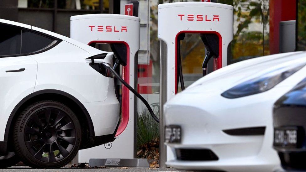 Electric vehicles line up outside a Tesla dealership in Melbourne.