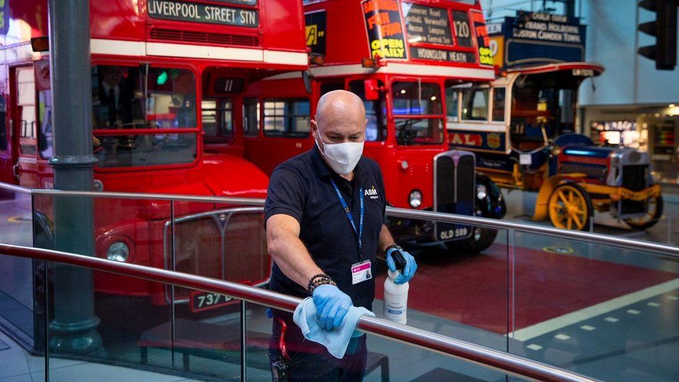 Man cleaning in London Transport Museum