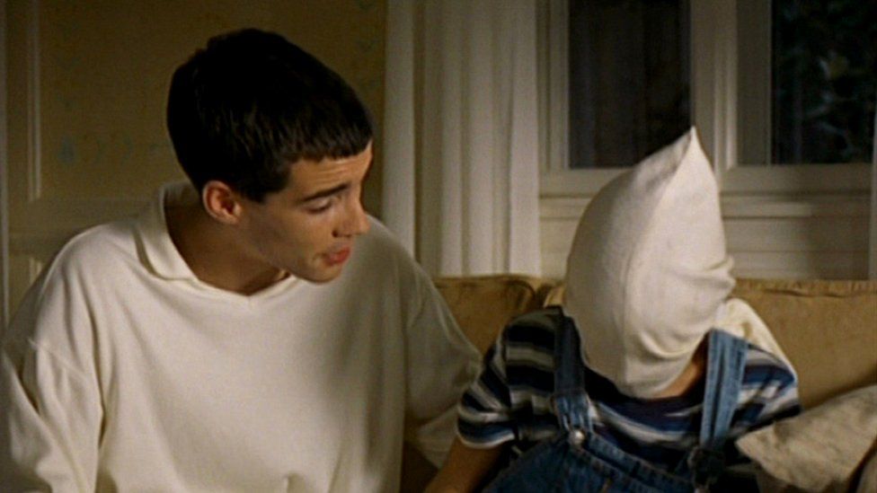 (L-R) Arno Frisch as Paul and Stefan Clapczynski as Georgie in Michael Haneke's chilling 1997 movie, Funny Games