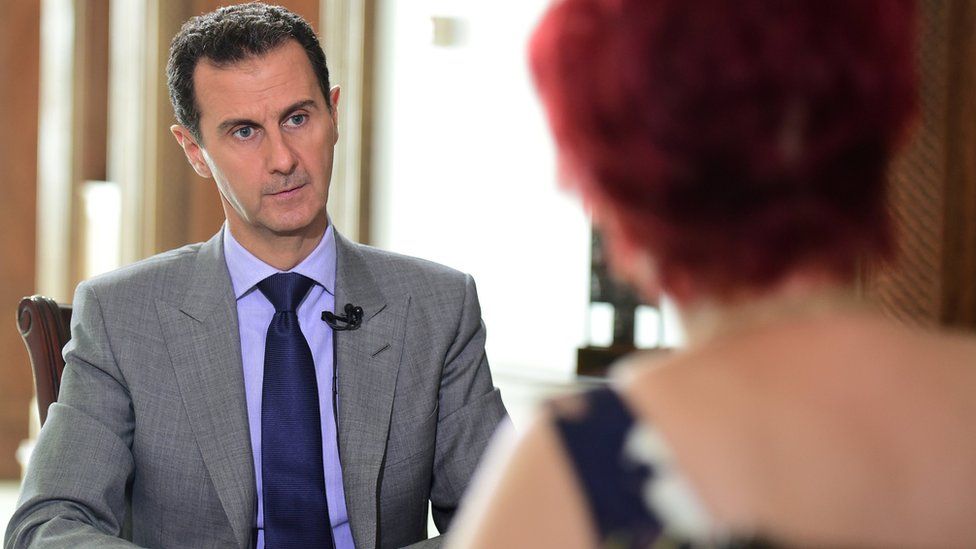 Syrian president Bashar al-Assad speaks to a journalist from Russian tabloid Komsomolskaya Pravda