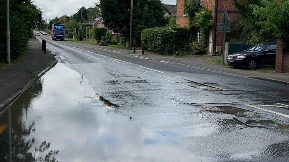 Burst sewer pipe shuts main road near Shrewsbury BBC News