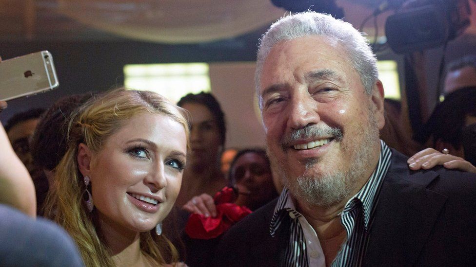 Fidel Ángel Castro Díaz-Balart poses with Paris Hilton as she takes a selfie during the gala dinner of the closing of the XVII Habanos Festival, in Havana, 27 February 2015