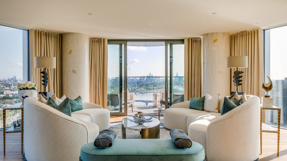 A luxury flat in London, with a view of the city's skyline