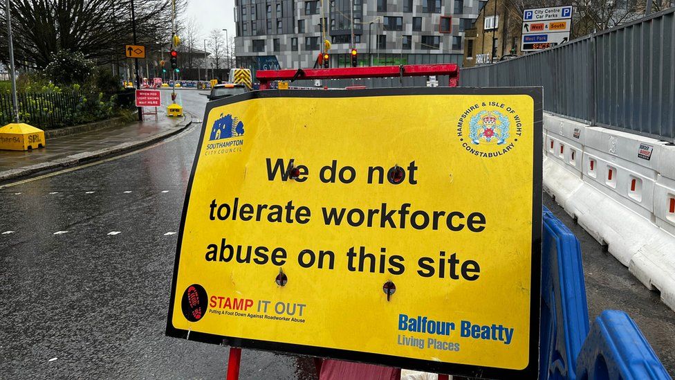 Road worker abuse sign