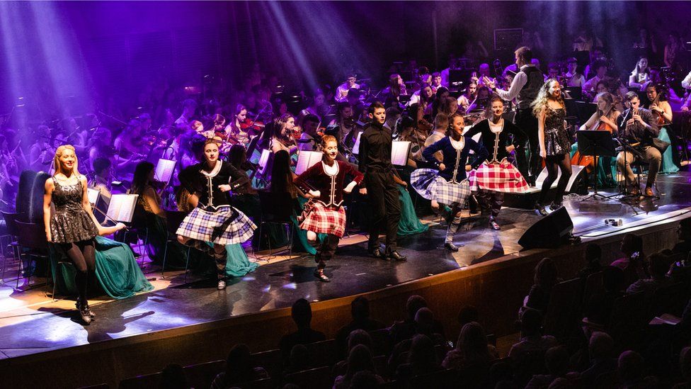 Irish and Highland dancers on stage with the orchestra in Belfast last year