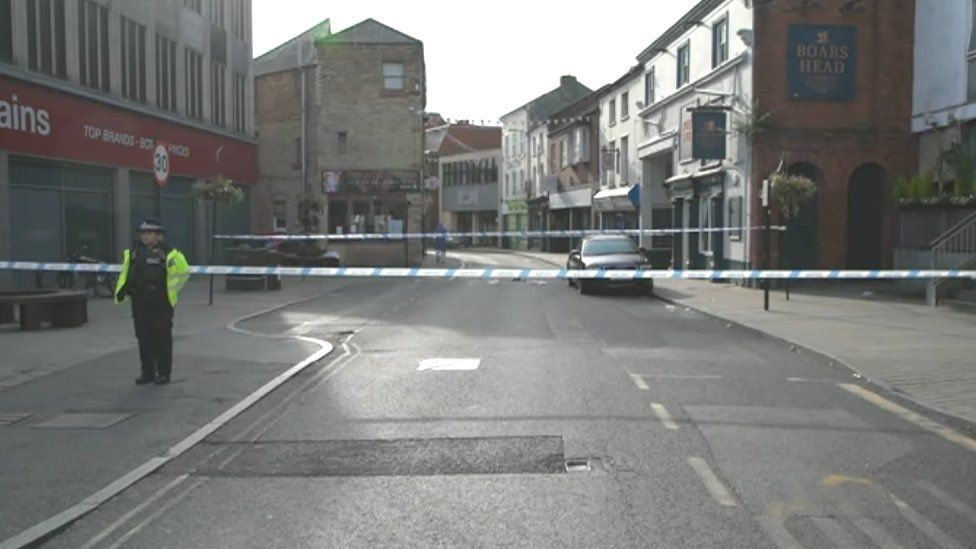 Police at the scene of a fatal hit-and-run crash in Oswestry