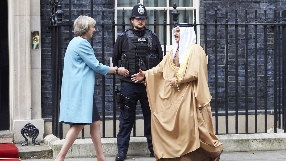British Prime Minister Theresa May greets King Hamad of Bahrain outside 10 Downing Street in London on 26 October 2016