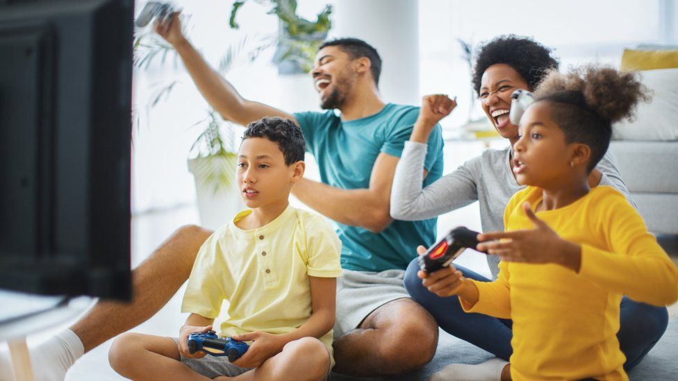 Family playing video games