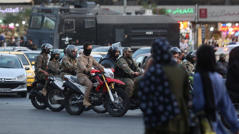 Iranian riot police officers drive motorcycles in Tehran, Iran (3 October 2022)