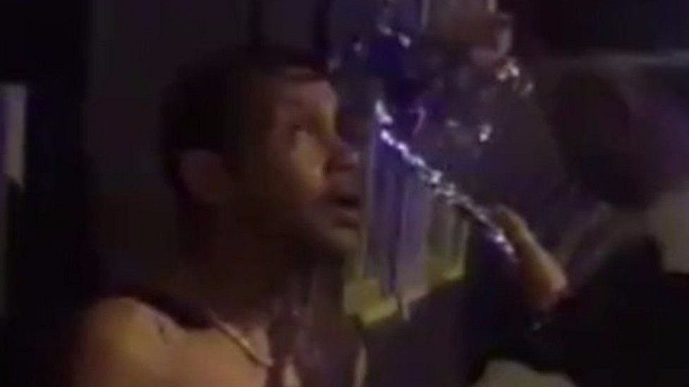 Acid victim doused with water