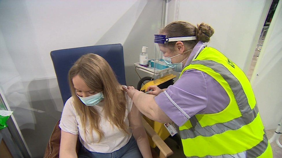 Emily Sanderson receiving the vaccine