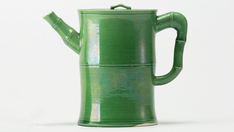 Green-glazed porcelain wine pot with bamboo-shaped handle and spout
