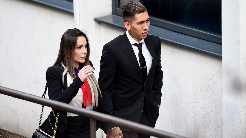 Roberto Firmino arriving at Liverpool City Magistrates Court with his wife Larissa Pereira