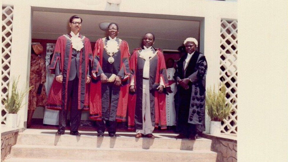 Manzoor Moghal, right, in his mayoral robes with other mayors and town clerk in Uganda
