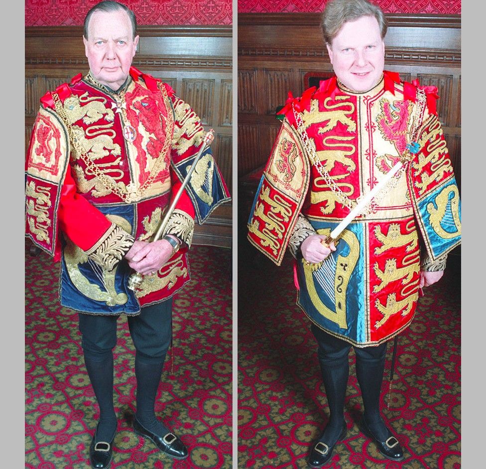 Sir Conrad Swan and Thomas Woodcock, both in ceremonial tabards