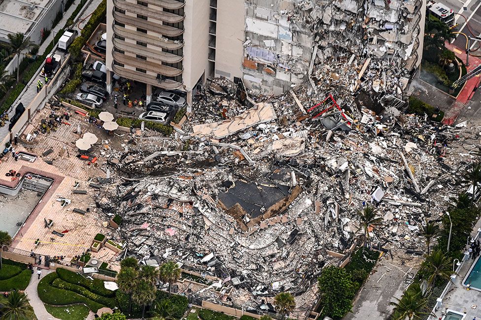 Search and rescue teams work on the site of a collapsed 12-storey apartment complex in Surfside, near Miami in Florida
