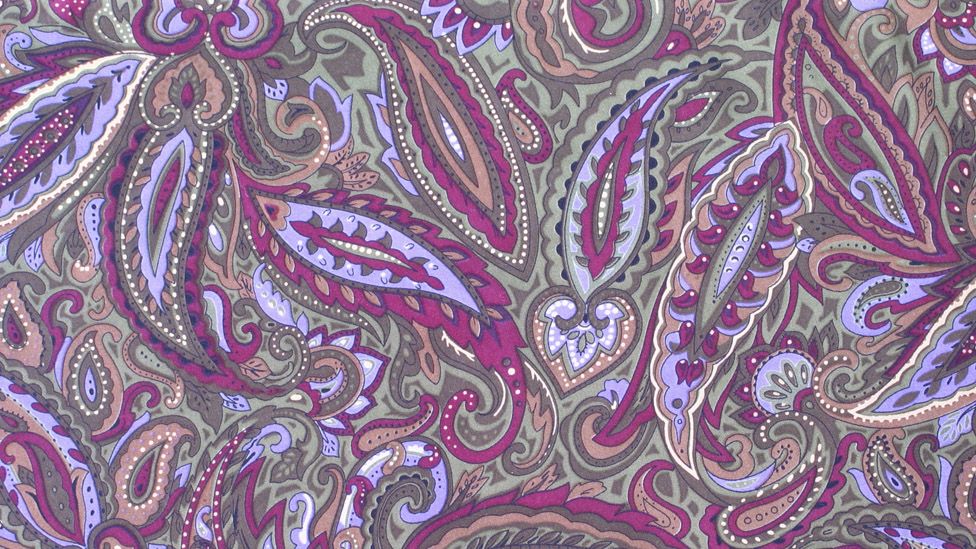 Purple paisley pattern on fabric