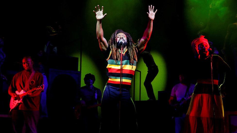 Arinze Kene performs as Bob Marley in Get Up, Stand Up! The Bob Marley Musical at the Lyric Theatre in London
