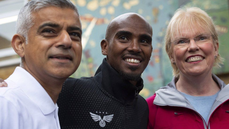 Elaine Wyllie pictured with London Mayor Sadiq Khan and athlete Mo Farah