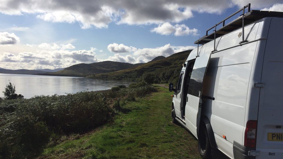 Barny Erdman's van pictured parked next to the coast during a trip around Scotland and Ireland
