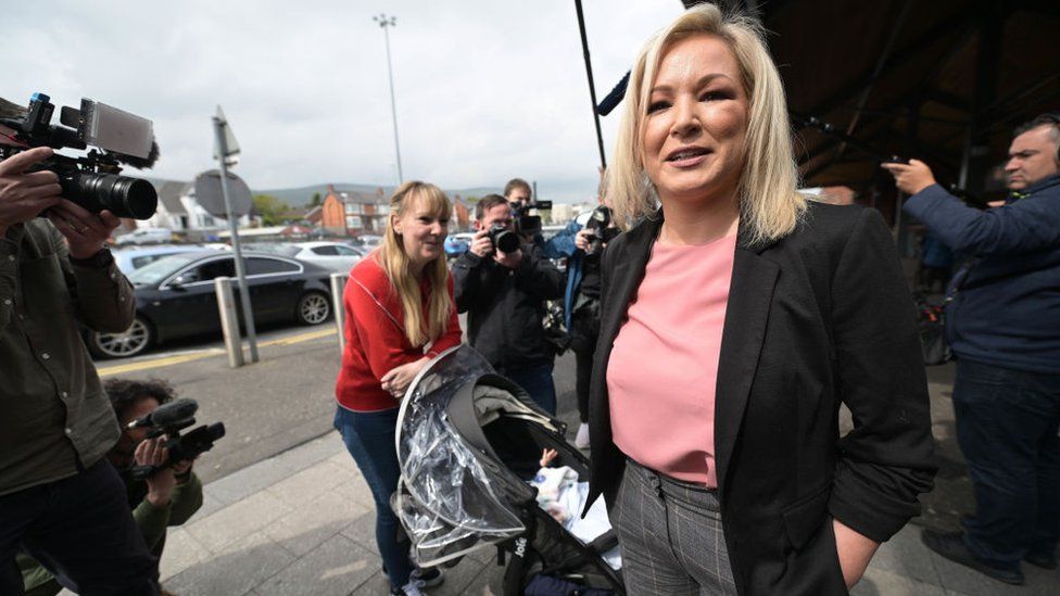 Sinn Fein northern leader Michelle O'Neill meets members of the public as she canvasses ahead of the Northern Ireland Assembly elections at Kennedy shopping centre on May 3, 2022 in Belfast, Northern Ireland. Recent polls suggest that Sinn Fein may become the largest party in Northern Ireland following the elections with Michelle O'Neill becoming First Minister elect, the first time Sinn Fein would be designated as First Minister in a power sharing government. (Photo by Charles McQuillan/Getty Images)