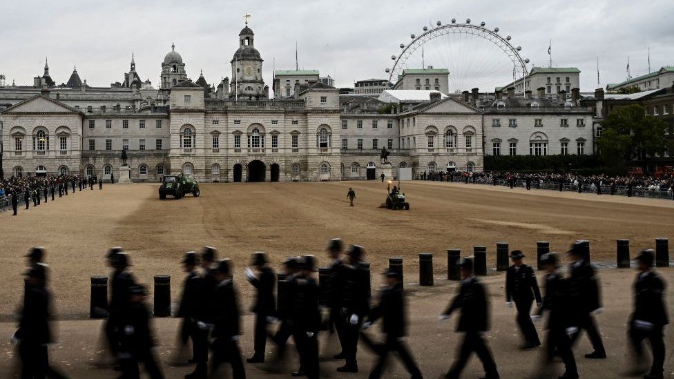 Police officers prepare on Horse Guards in London ahead of the State Funeral of Queen