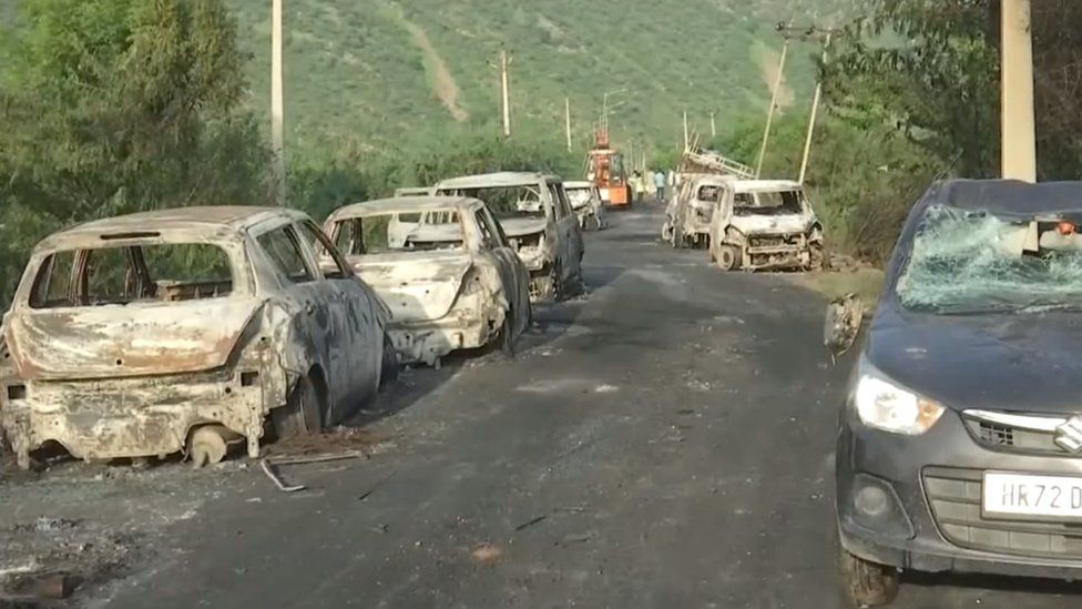 Burnt cars seen in Nuh