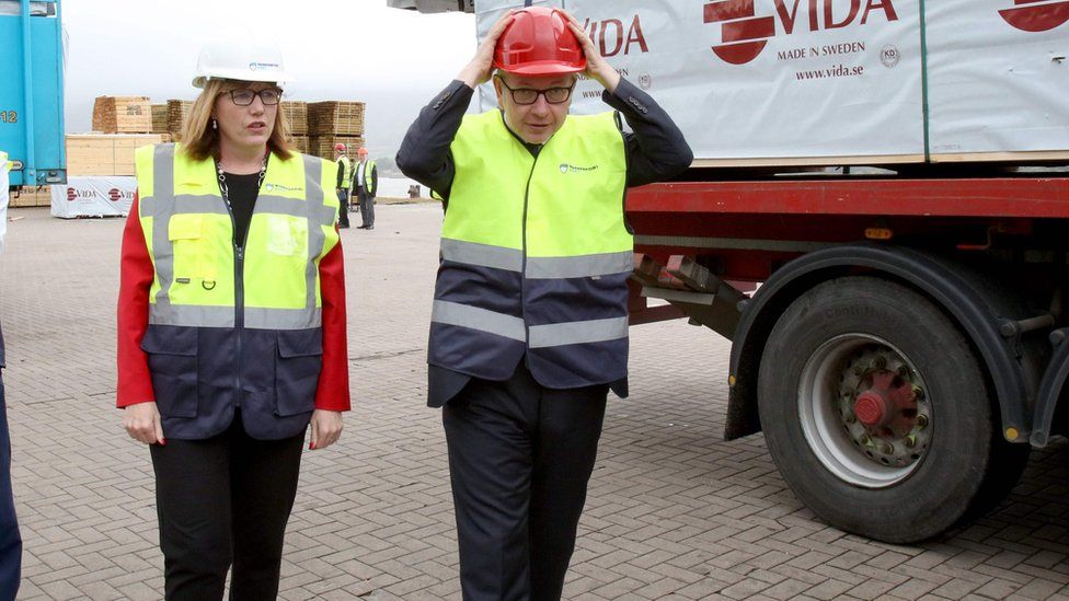 Clare Guinness CEO of Warrenpoint Harbour with Michael Gove on 9 August 2019