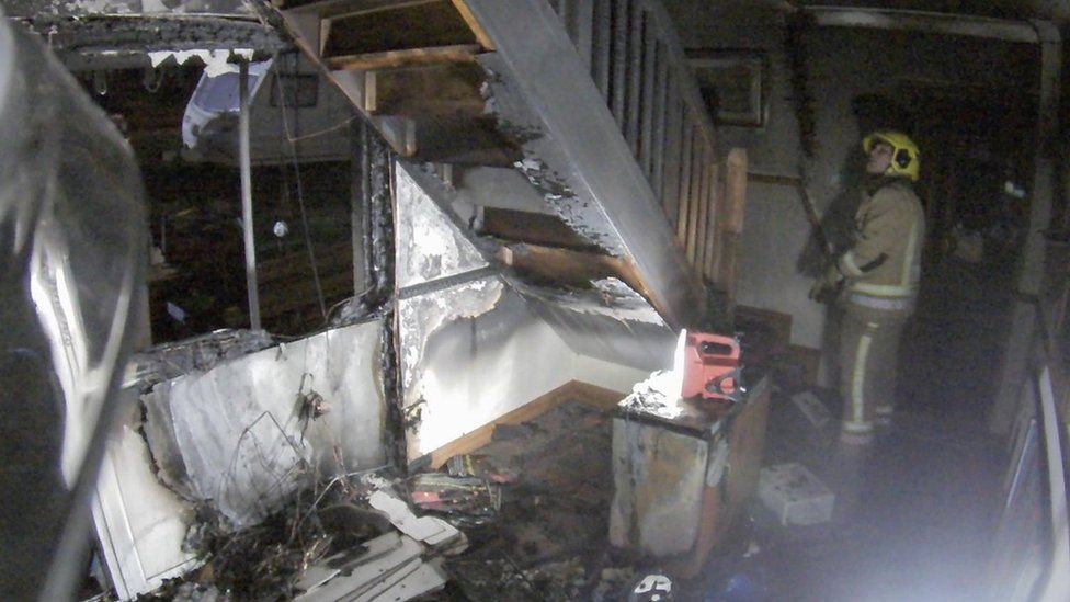 Man and dogs saved from Weymouth 'Christmas lights fire' BBC News