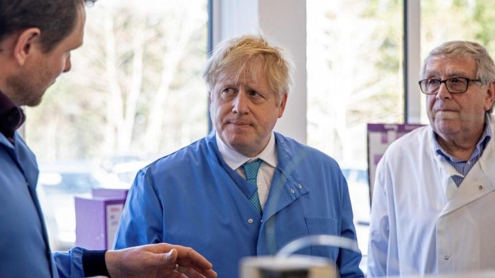 Prime Minister Boris Johnson visits to the Mologic Laboratory in the Bedford technology Park, north of London