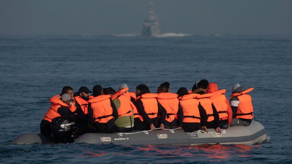 People arriving on a small boat