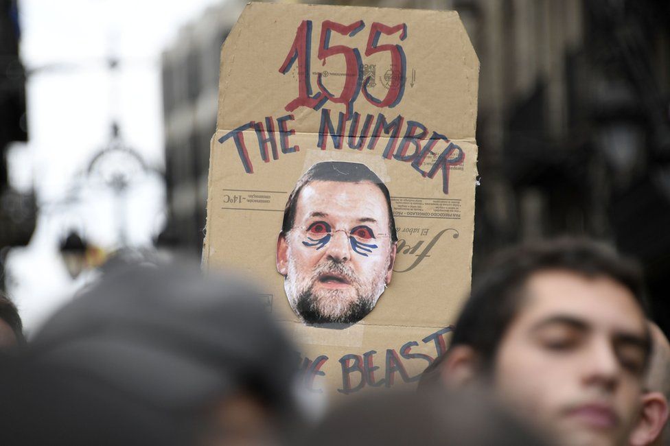 A poster mocks Mariano Rajoy in Barcelona, 8 November