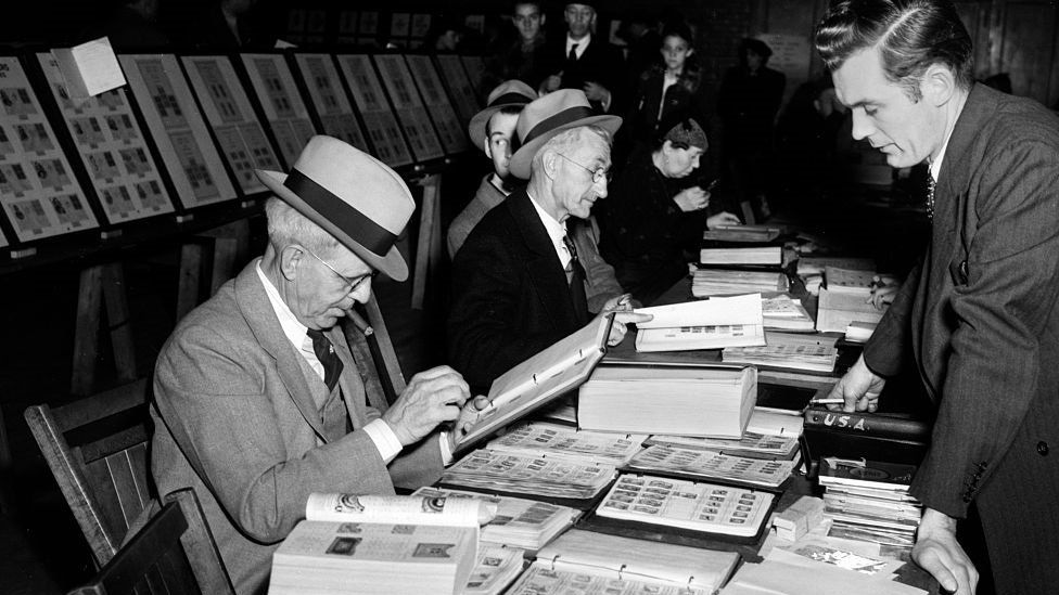 Stamp traders and dealers at a 1950s fair