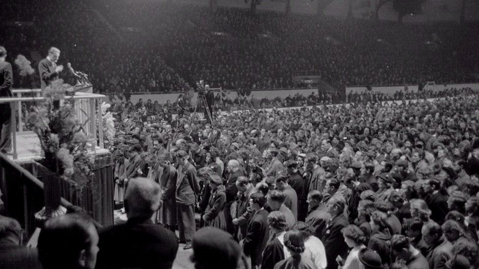 Billy Graham preaching at Harringay Arena in London in 1954
