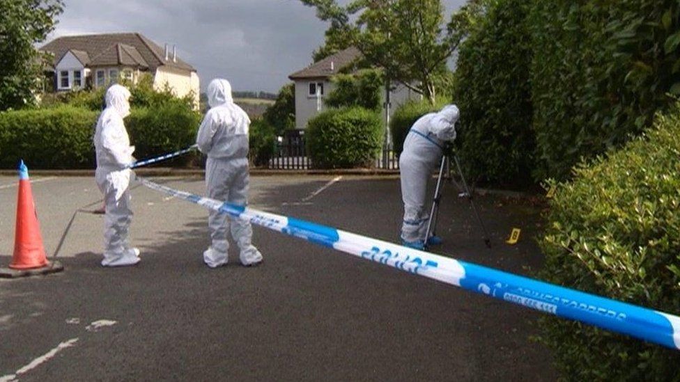 forensic officers at scene