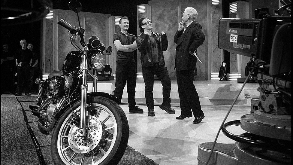 On his last Late Late Show Larry Mullen and Bono from U2 gave Gay a Harley Davidson