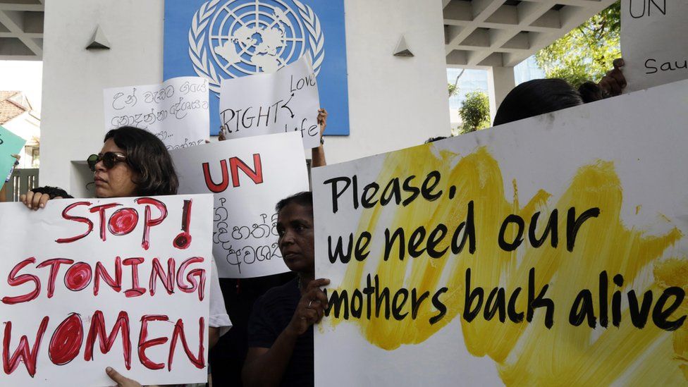 Sri Lankan human rights activists protest against a Saudi death by stoning sentence of a migrant worker accused of adultery, opposite the UN office in Colombo, Sri Lanka