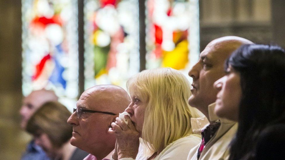 Churchgoers during a service for Jo Cox at St Peter's Church in Birstall